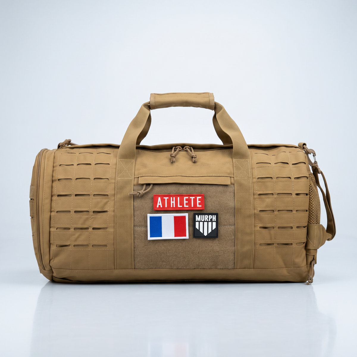 Sac polochon Murph marron vu de face avec patchs velcro sur le panneau